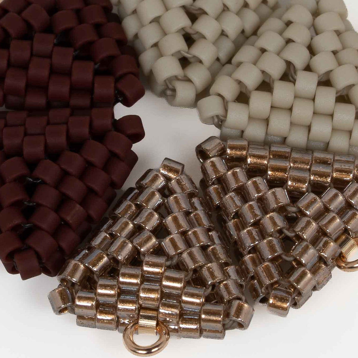 Greige, antique copper, and oxblood, hand-woven in Japanese glass beads. Interchangeable MODUS sets.