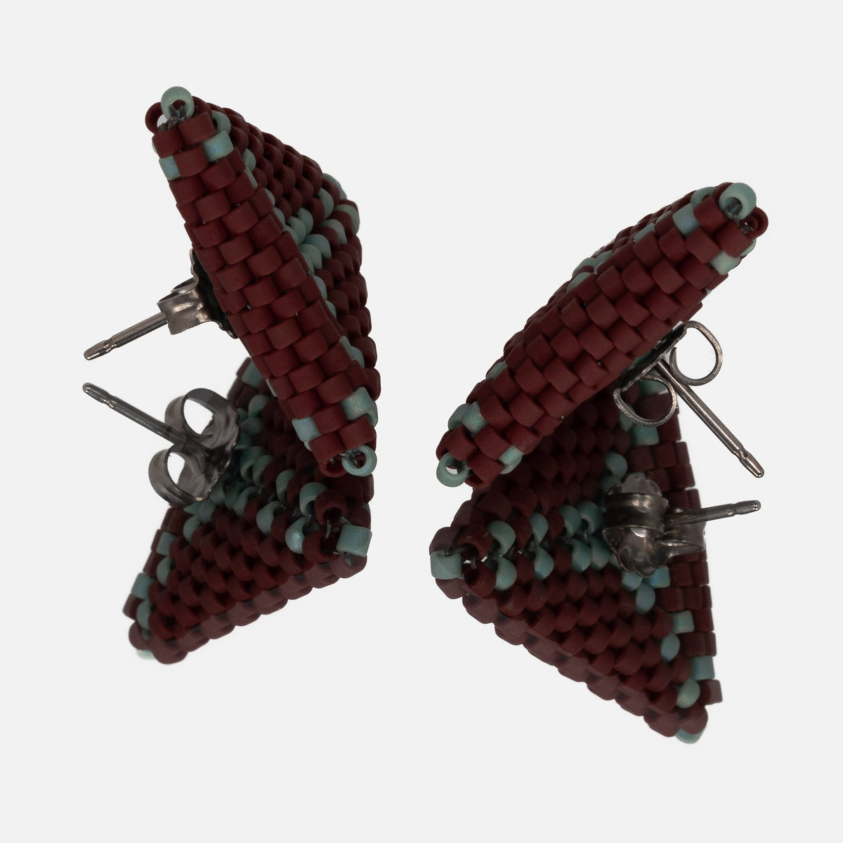 Back of the burgundy and seafoam beaded triangle earrings, showing titanium posts and butterfly backs