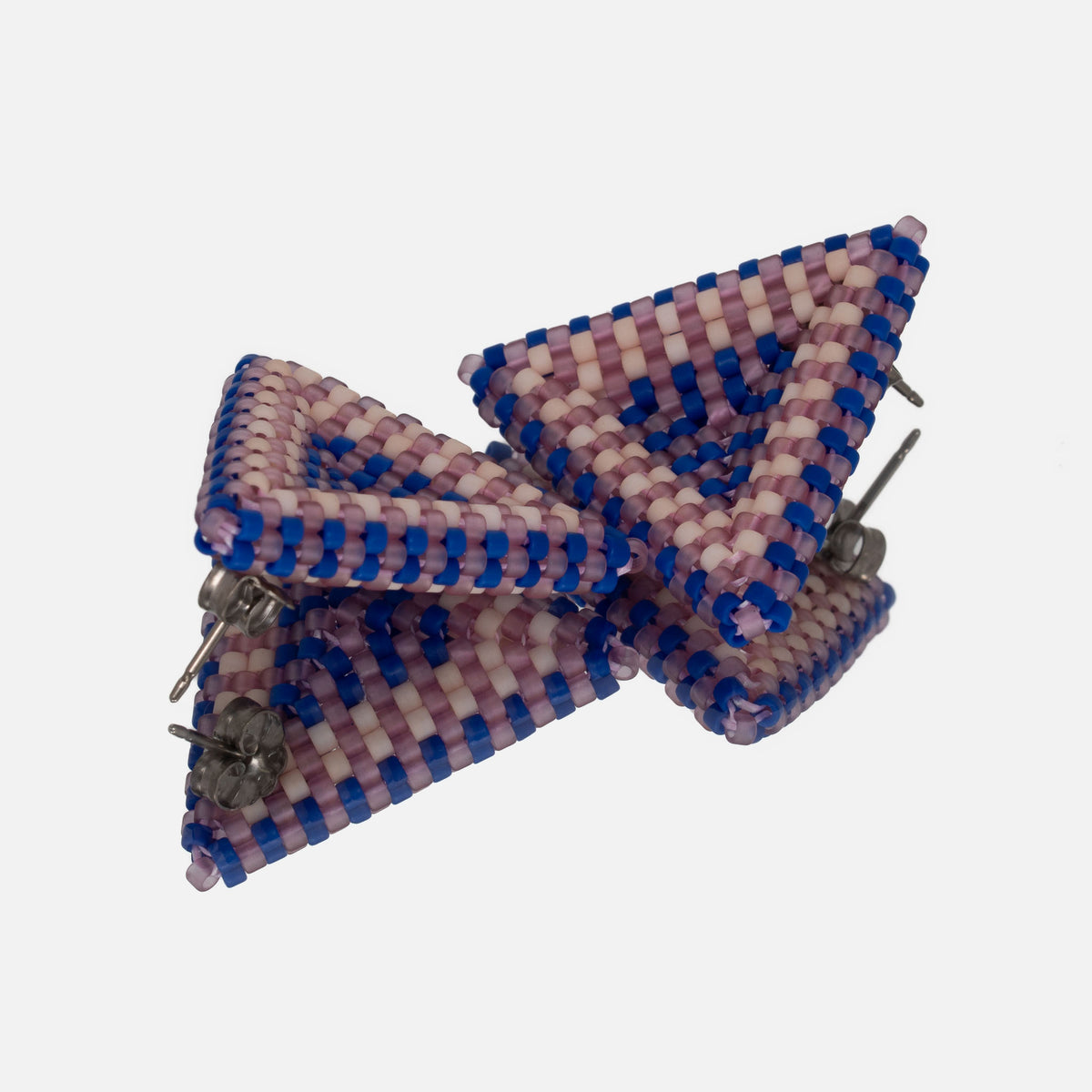 Back of the lilac, cobalt, and bone beaded triangle earrings, showing titanium posts and butterfly backs