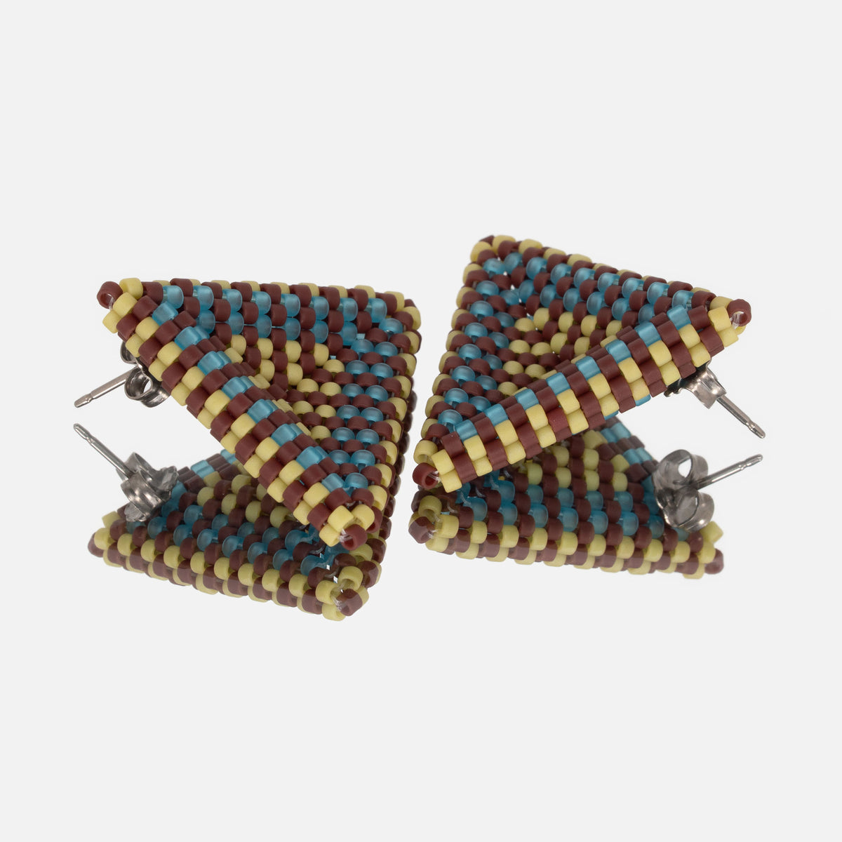 Back of the oxblood, aqua, and spring green beaded triangle earrings, showing titanium posts and butterfly backs