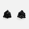 Pair of tiny triangular beaded stud earrings in near-black gunmetal metallic beads, front view on a light gray background