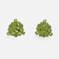 Pair of tiny triangular beaded stud earrings in soft matcha green with a pearly luster, front view on a light gray background