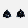 Pair of tiny triangular beaded stud earrings in silver-lined midnight blue, front view on a light gray background