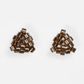 Pair of tiny triangular beaded stud earrings in antique copper-lined glass beads, front view on a light gray background