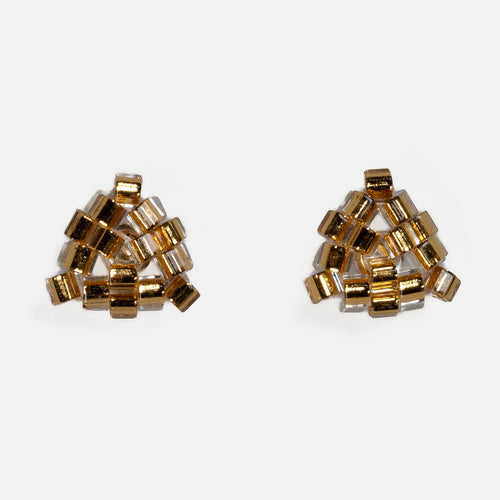 Pair of tiny triangular beaded stud earrings in gold-lined crystal hex beads, front view on a light gray background