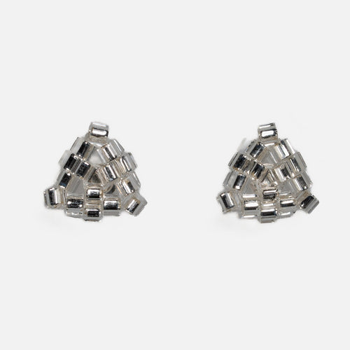 Pair of tiny triangular beaded stud earrings in silver-lined crystal hex beads, front view on a light gray background