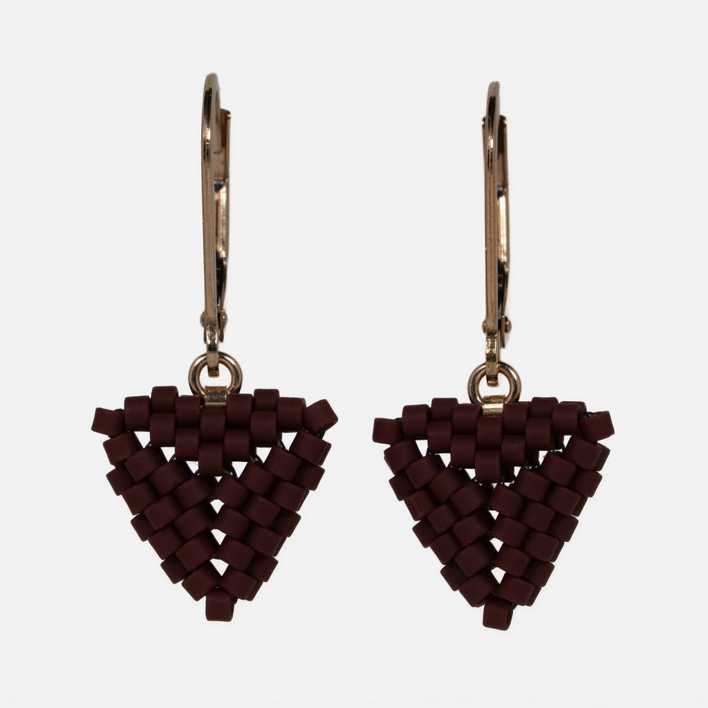 Pair of hand-woven oxblood beaded triangle earrings on gold-filled lever-backs, hanging against a white background.
