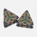 Pair of hand-woven periwinkle, sea green, and tan beaded triangle earrings, standing on a mirror