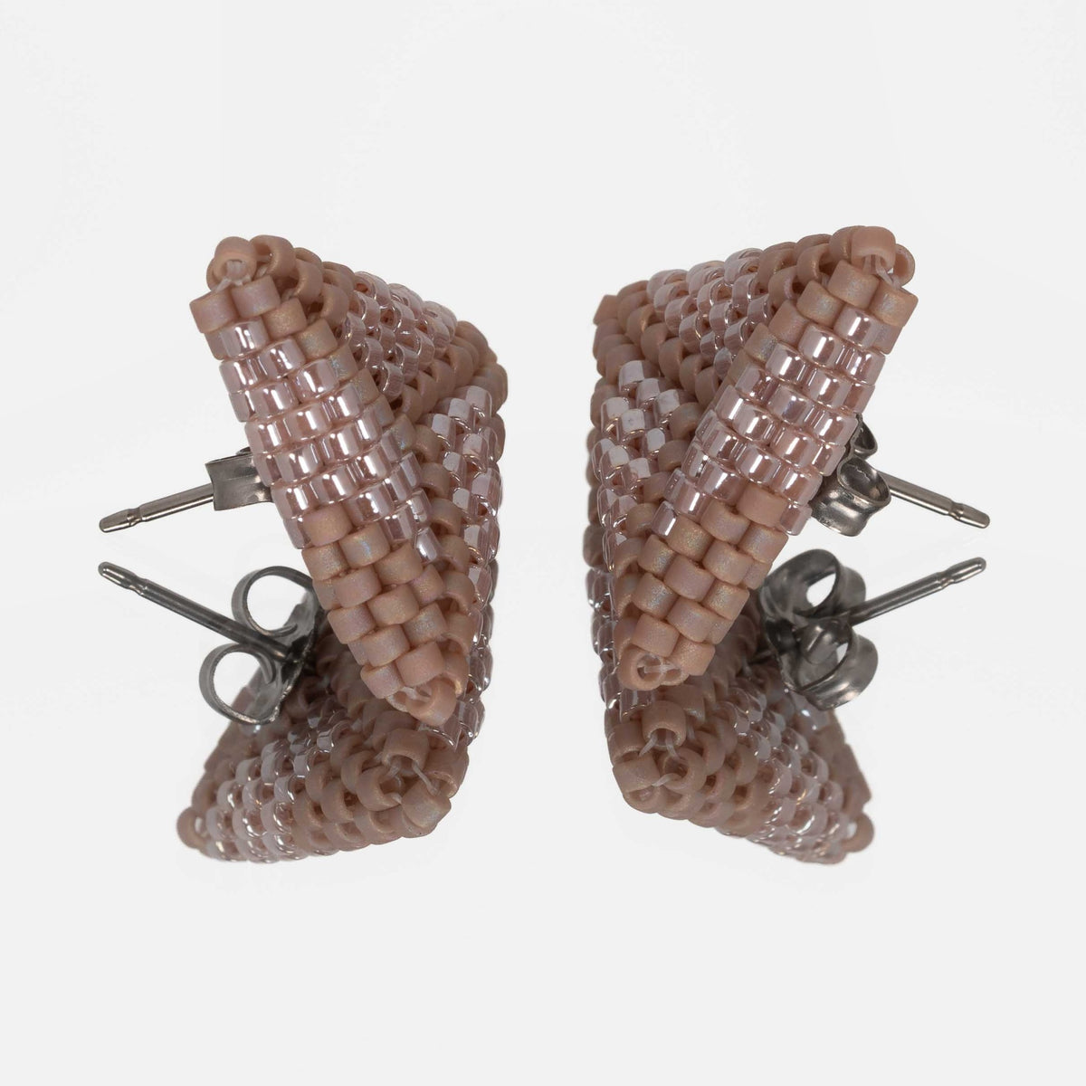 Back of the rose taupe beaded triangle earrings, showing titanium posts and butterfly backs