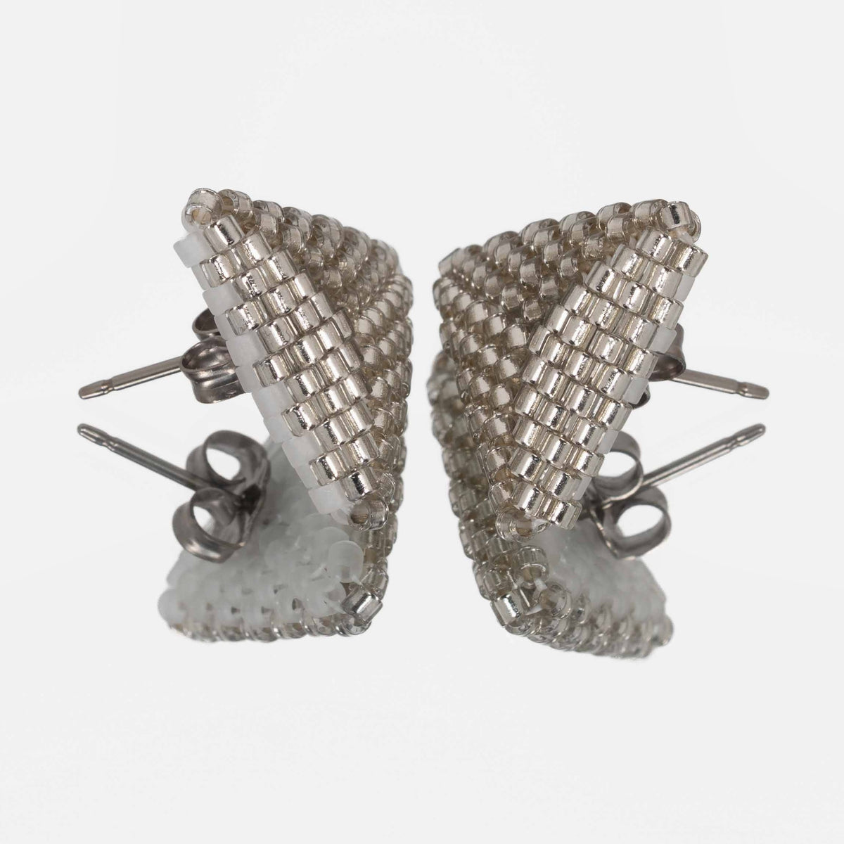 Back of the silver-lined beaded triangle earrings, showing titanium posts and butterfly backs