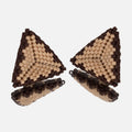 Pair of hand-woven beaded triangle earrings in matte tan with a stepped chocolate brown border, standing on a mirror